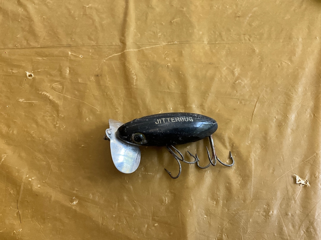 black jitterbug fishing lure Vintage Fred Arbogast Wooden Musky For Sale up of surface lures Black jitterbug for moonlight topwater