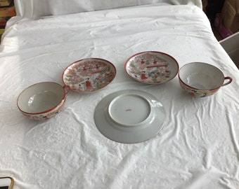 Tea Set Consisting of 2 Cups With Saucers and a 6.25”dia