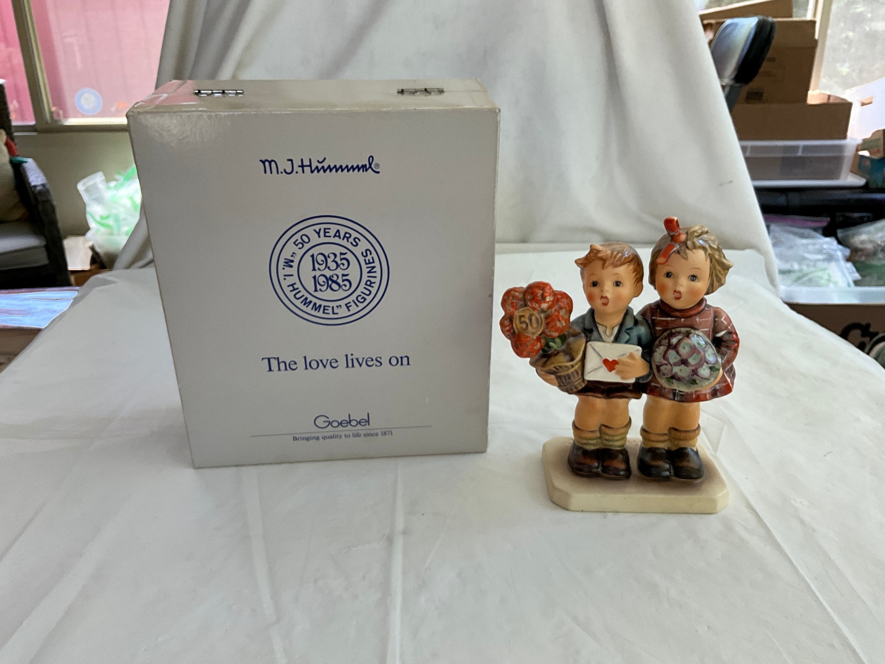 Goebel MJ Hummel 6.5”T Figurine - “the Love Lives On”- 50 Years of