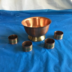Vintage Gregorian Copper 5”Dia Bowl on a Goldtone Pedestal w/ 4 Copper w/ Goldtone Band Napkin Rings