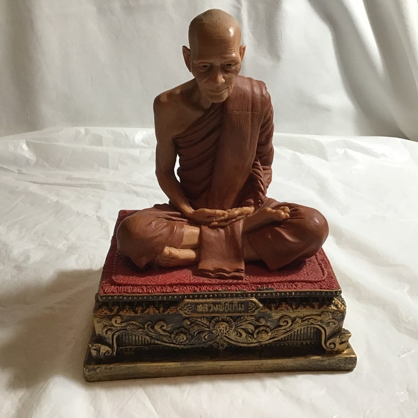 Resin Tibetan Praying Buddhist Priest Sitting on a Cast Iron Ornate Raised Platform