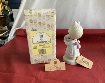 From the Enesco Precious Moments Collection - Special 1990 Limited