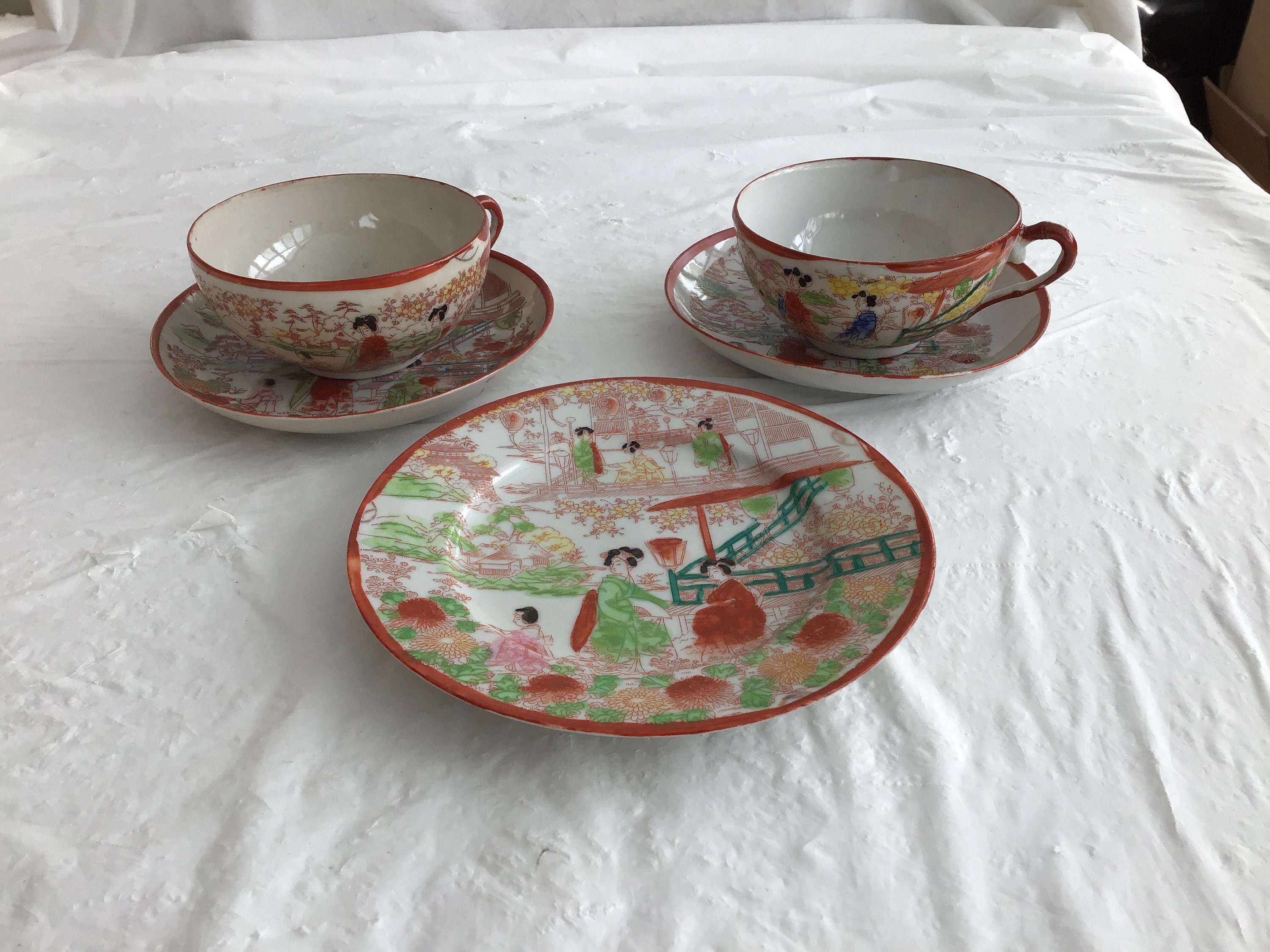 Tea Set Consisting of 2 Cups With Saucers and a 6.25”dia