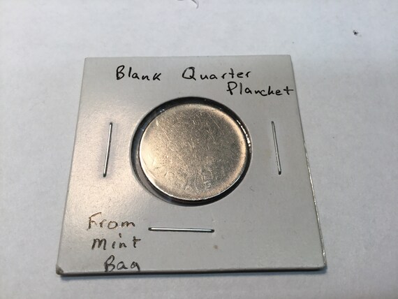 blank quarter planchet from
