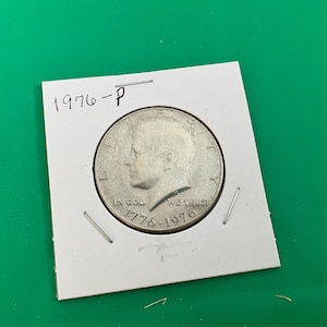 Double Dated 1776-1976-P - John F Kennedy Half Dollar Coin - No 19876 - In a Protective 2x2