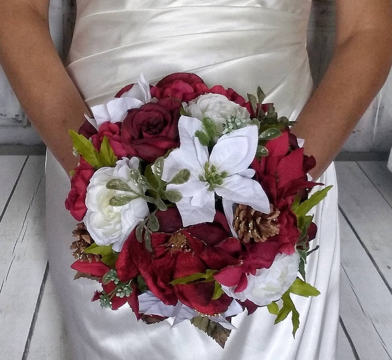 Winter wedding bouquet burgundy poinsettia bouquet