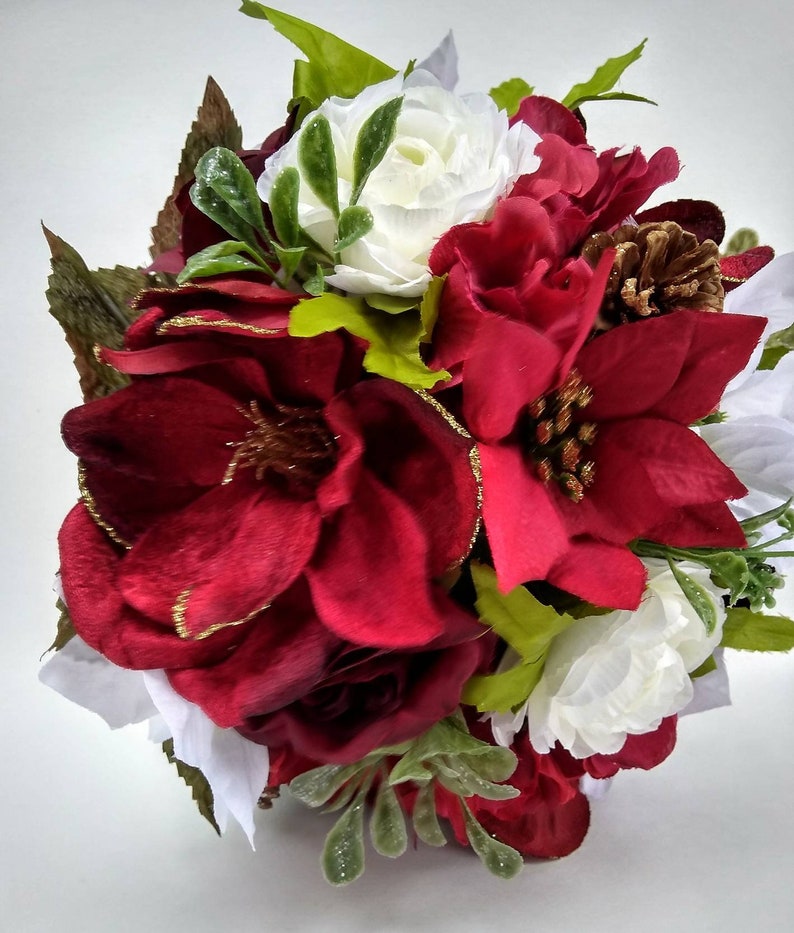 Winter wedding bouquet burgundy poinsettia bouquet