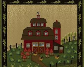 May include: A red barn with a green roof and white windows sits on a hill with a green field in front of it.  There are chickens and a rooster in the field, and a red wagon with a basket of vegetables.