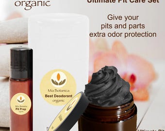 May include: Mia Botanica organic Ultimate Pit Care Set includes a Pit Prep roll-on bottle, a Best Deodorant organic stick, and an Ultimate Pit Detox Mask in a brown jar with black cream. Text reads: Give your pits and parts extra odor protection.