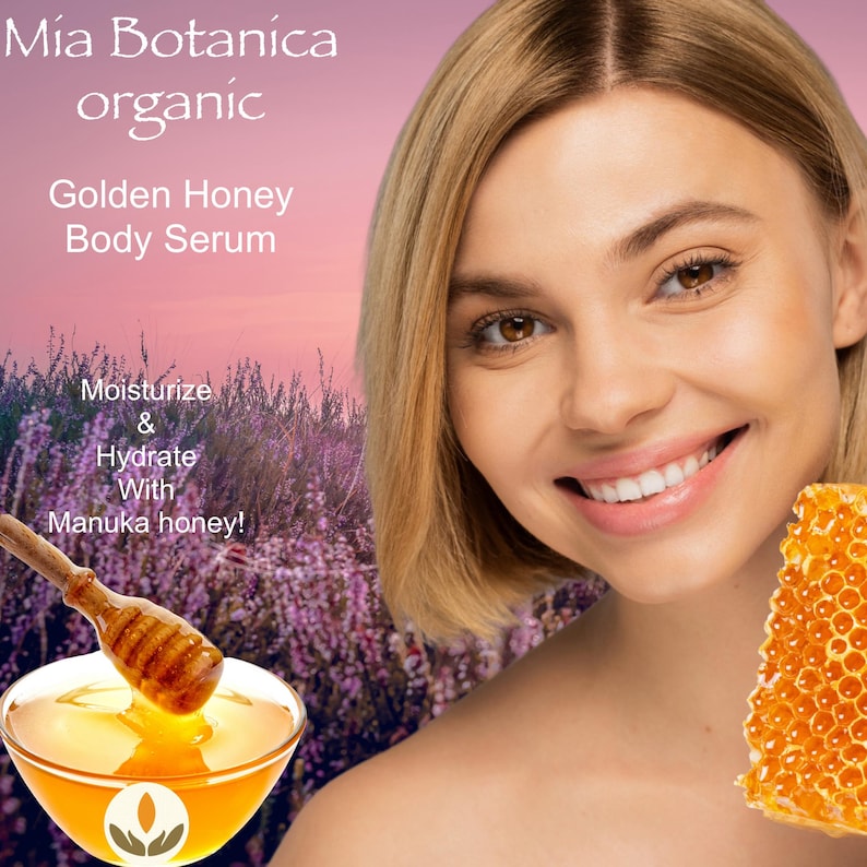 May include: An advertisement for Mia Botanica's Golden Honey Body Serum. The image features a woman smiling, a bowl of honey with a honey dipper, and a honeycomb. Text on the image reads "Moisturize & Hydrate With Manuka honey!"