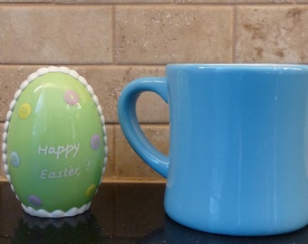 MM52 Large Ceramic Sky Blue Mug with Yellow M&M Character Wearing Bunny Ears