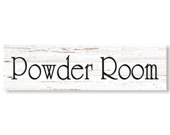 May include: White wooden sign with black text that reads "Powder Room".