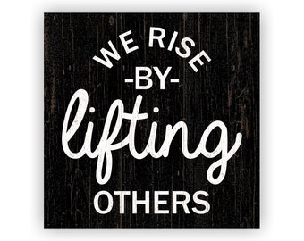 We Rise By Lifting Others Sign