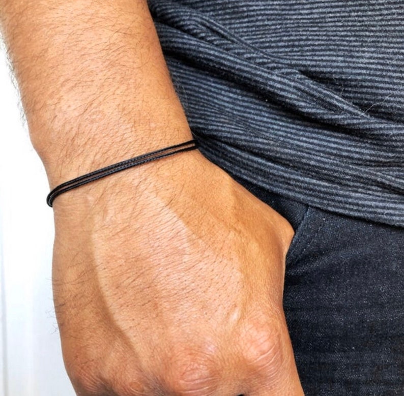 Minimalist adjustable nylon cord bracelet with sliding knot closure