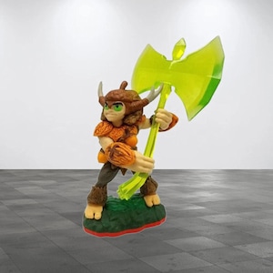 May include: A green and brown action figure of a character holding a glowing green axe. The character has a brown beard and horns, and is wearing a brown and orange outfit.