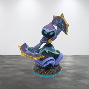 May include: A purple and blue character with a hooded cloak and a star-shaped weapon. The character is standing on a circular base with a star pattern.