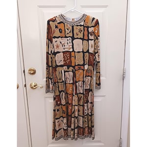 dress in floral and abstract geometric printed silk jersey Diane von Furstenberg Geometric Printed Silk Jersey Penna Wrap Dress M Diane Von Furstenberg