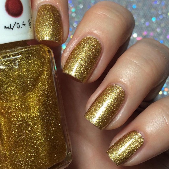 Golden nail paint deals