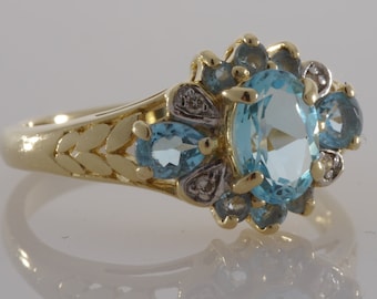 Vintage 14k Yellow Gold Blue Topaz and Diamond Halo Ring