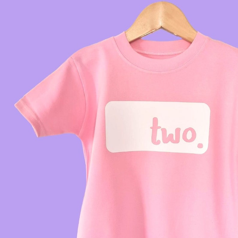 Pale pink cotton tshirt with 'TWO' white print