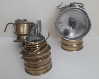 Premier Lamp & Engineering co. 2 x Brass Bike Lamps. British made. Carbide type. No glass. 9 x 5.5cm. Base unscrews. Some parts missing.
