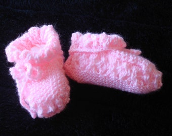 Baby Booties knitted in a lace pattern in Pink 3 ply Bella Baby "Baby Wonder" with a crocheted cord