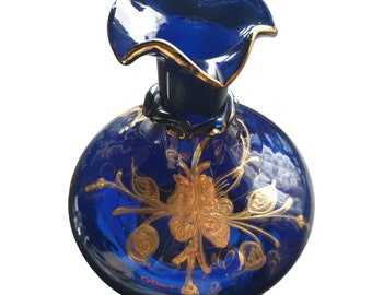 Vintage cobalt blue glass vase with golden flowers