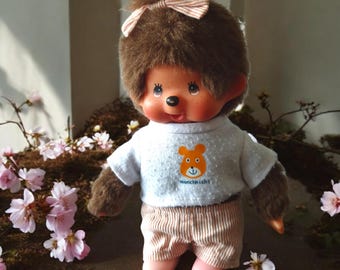 Monchhichi girl with Monchhichi t shirt striped trousers and pink shoes vintage collectible toy 1980s