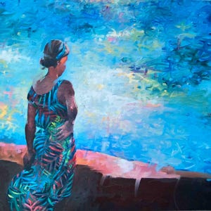 May include: A woman in a blue and green patterned dress stands on a ledge overlooking a blue and green water scene. The woman is facing away from the viewer and has her back to the camera.