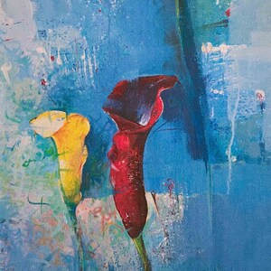 May include: A painting of three flowers on a blue background. The flowers are a red calla lily, a yellow calla lily, and a yellow flower with a long stem. The background is a textured blue with white and red accents.