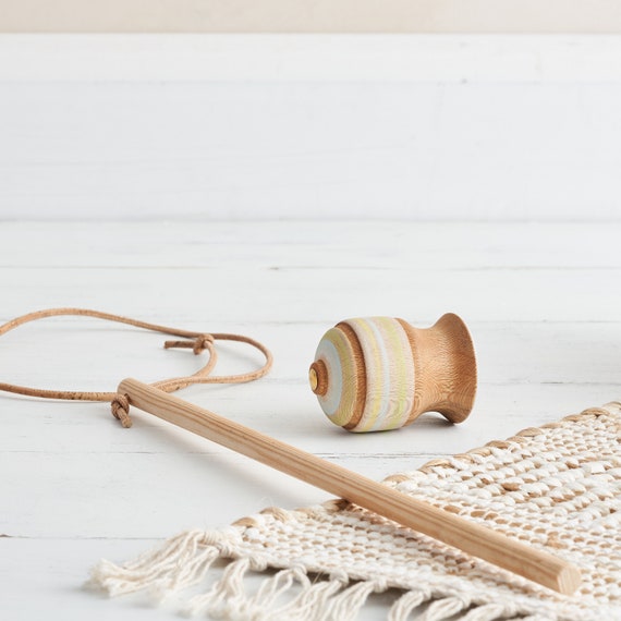 spinning top with string
