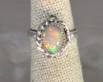 genuine Ethiopian opal gemstone handmade sterling silver solitaire ring  size 4