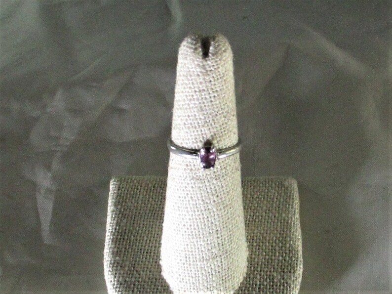 genuine pink sapphire gemstone is set in handmade sterling silver solitaire ring size 6