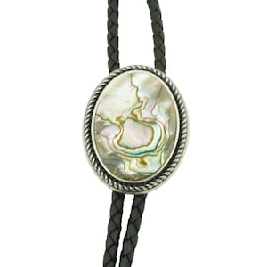 May include: Oval bolo tie with a silver-tone frame and a natural abalone shell inlay. The shell displays iridescent colors of green, blue, and gold. The tie features a black braided leather cord.