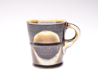 taza de espresso + cortado