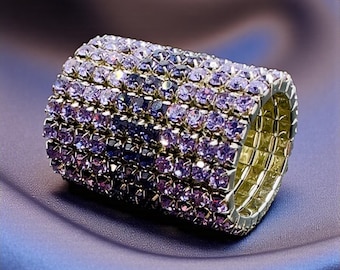 Purple/Tanzanite Barrel Bling™   (NEW COLOR). 2 Copper barrel finish protectors/app rod, storage bag, cleaning cloth, install. instruct.