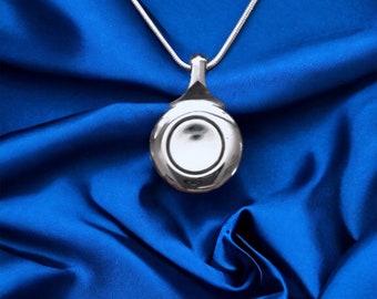 Silver Flute Key Necklace with matching silver plated snake chain. Plateau (closed hole key)