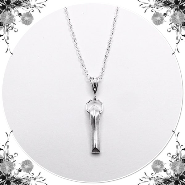 Flute "Foot" Silver Necklace hanging from a delicate Sterling silver bail with elegant silver rolo chain. Cut from real flute keys!