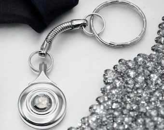 Flute Keychain made with a French silver open Hole Flute Key with inset Opal Swarovski on snake chain with silver split ring for keys.