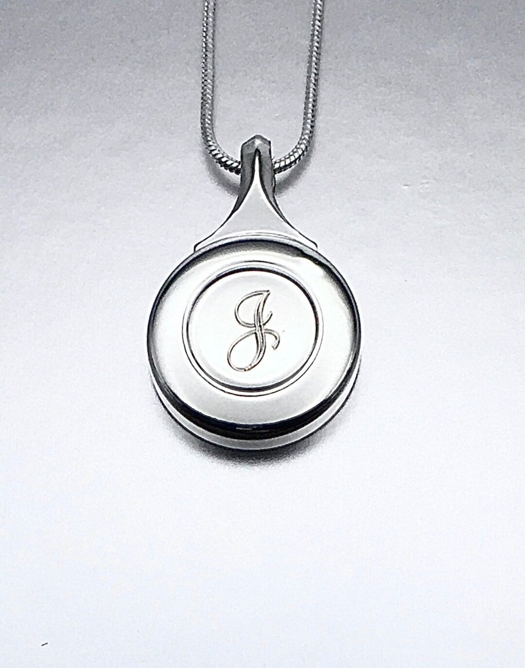 Engraved Silver Flute Key Necklace With Elegant Script Lettering and Matching Silver Snake Chain