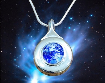 Flute Key Necklace- “Planet Earth” Graphic Glass Cabochon on a closed hole (plateau) key hanging from a silver snake chain