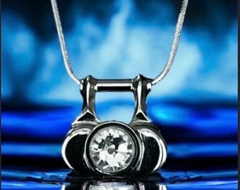 Silver Piccolo Key Necklace with Swarovski Crystal in the center with matching silver Plated snake chain. Hard to find key!