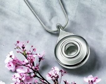 Flute Necklace Silver Open Hole (French) flute key with matching silver plated snake chain.