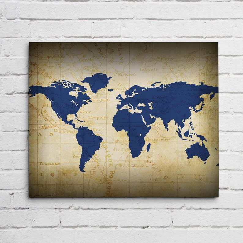 explore world map wall art canvas world map print in navy etsy
