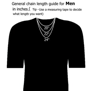 May include: A black t-shirt displays a chain length guide for necklaces. The guide shows three necklace lengths: 20", 22", and 24" inches. The text advises using a measuring tape to determine the desired length. The guide is for men.
