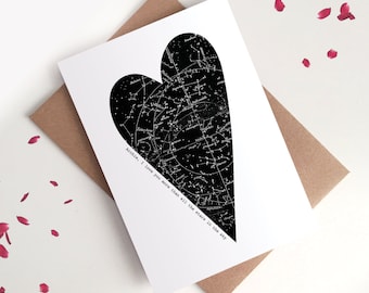 May include: A white card with a black heart-shaped constellation print. The text "Archie, I love you more than all the stars in the sky" is printed below the heart.