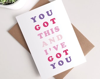 May include: A white card with the text "YOU GOT THIS AND I'VE GOT YOU" in a gradient of purple, pink, and red.