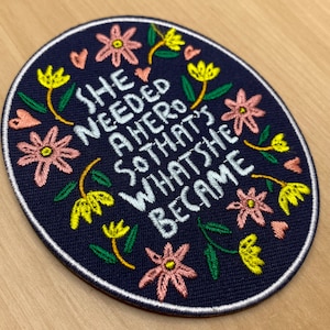 She needed a hero so thats what she became Patch 7.5 cm diameter to iron on - feminism affirmation faith motivation saying motto