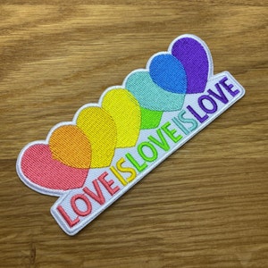 Love is Love is Love - Rainbow Lettering Heart Patch - 11 x 4.5 cm - for ironing - LGBTQ Backpacking Colorful Tolerance Peace Gay Pride