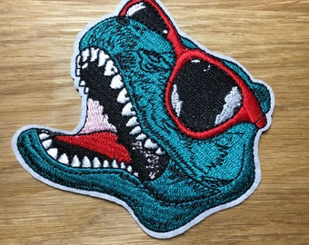 Cooler T-Rex mit Sonnenbrille Patch Tyrannosaurier 7cm x 8cm zum Aufbügeln - grüner Dino Flicken Aufnäher